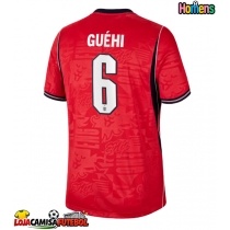 Camisa de Futebol Inglaterra Marc Guehi #6 Equipamento Secundário Mundo 2026 Manga Curta